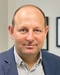 Dr Andrew Riley
